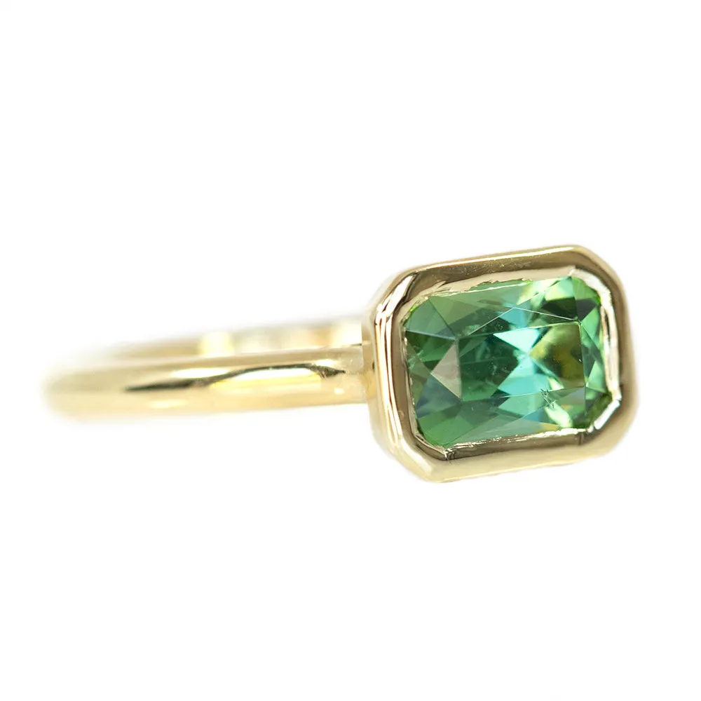 1.41ct Radiant Cut Green Tourmaline East-West Bezel Set In 14k Yellow Gold