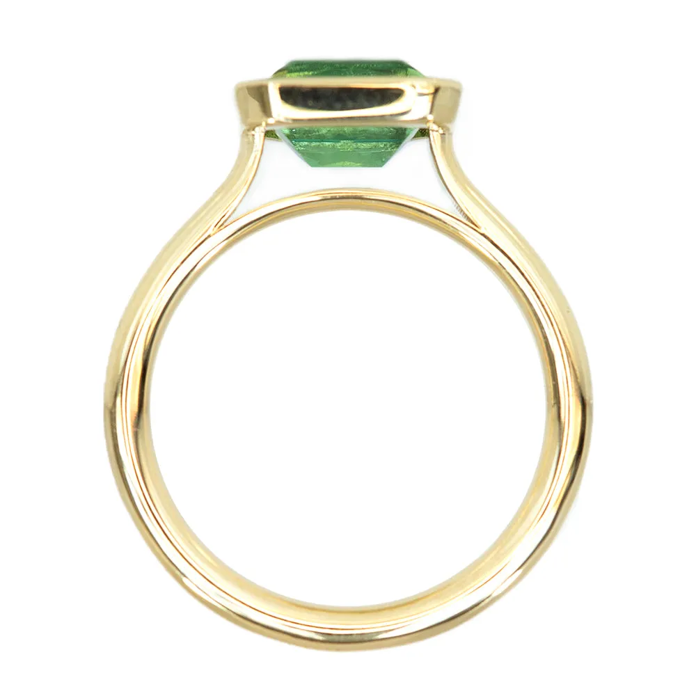 1.41ct Radiant Cut Green Tourmaline East-West Bezel Set In 14k Yellow Gold