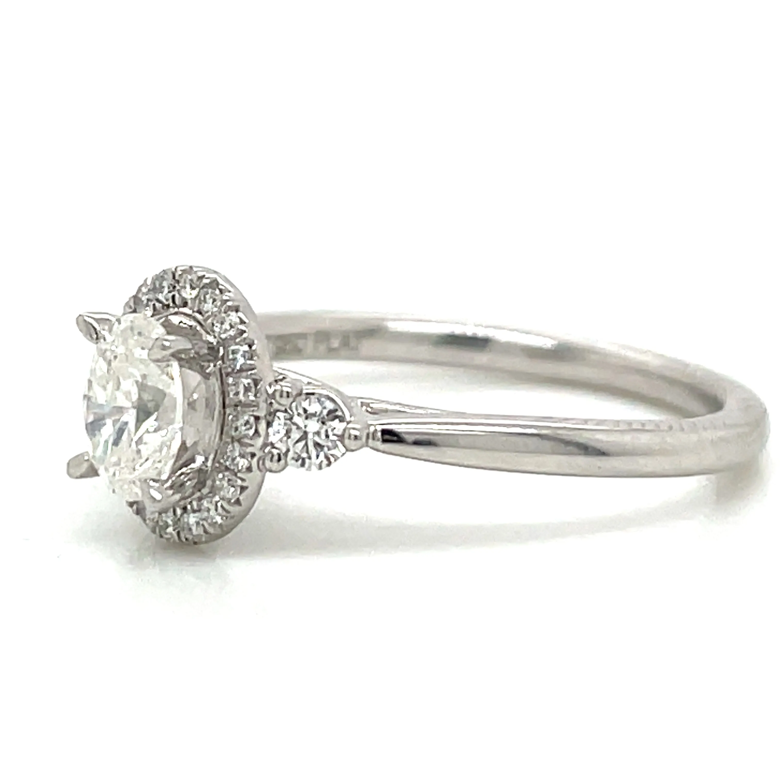 Remi - Platinum Natural 0.71ct Oval Halo Diamond Engagement Ring With Two Side Diamonds