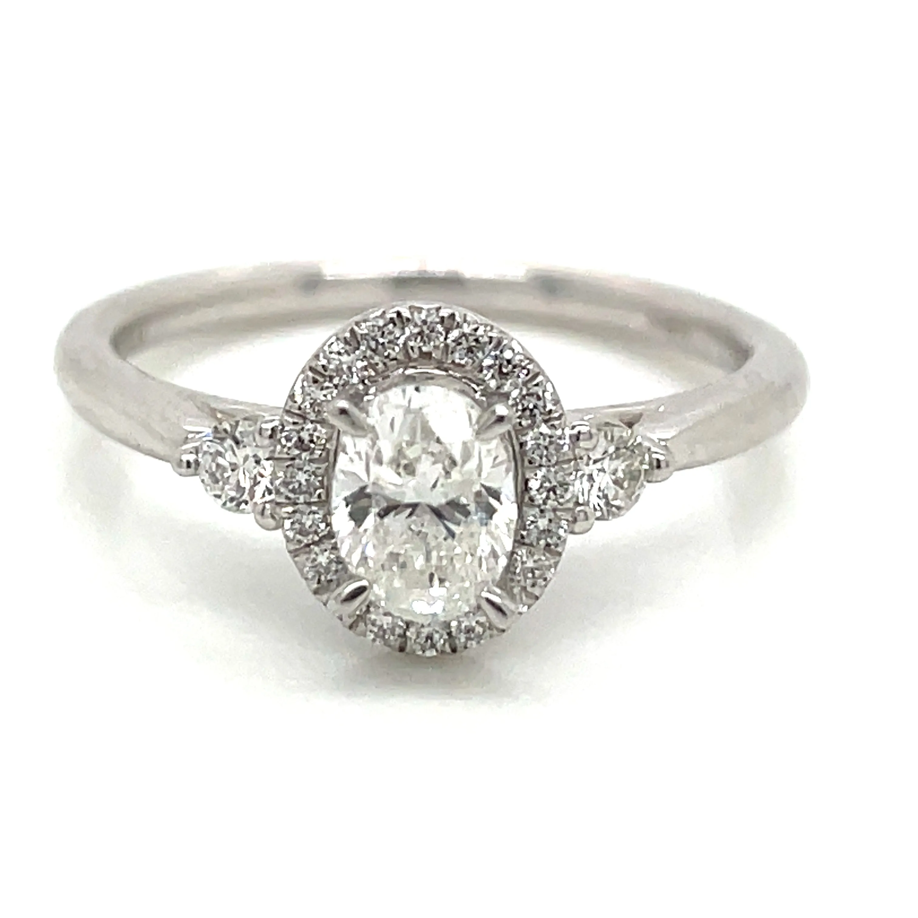 Remi - Platinum Natural 0.71ct Oval Halo Diamond Engagement Ring With Two Side Diamonds