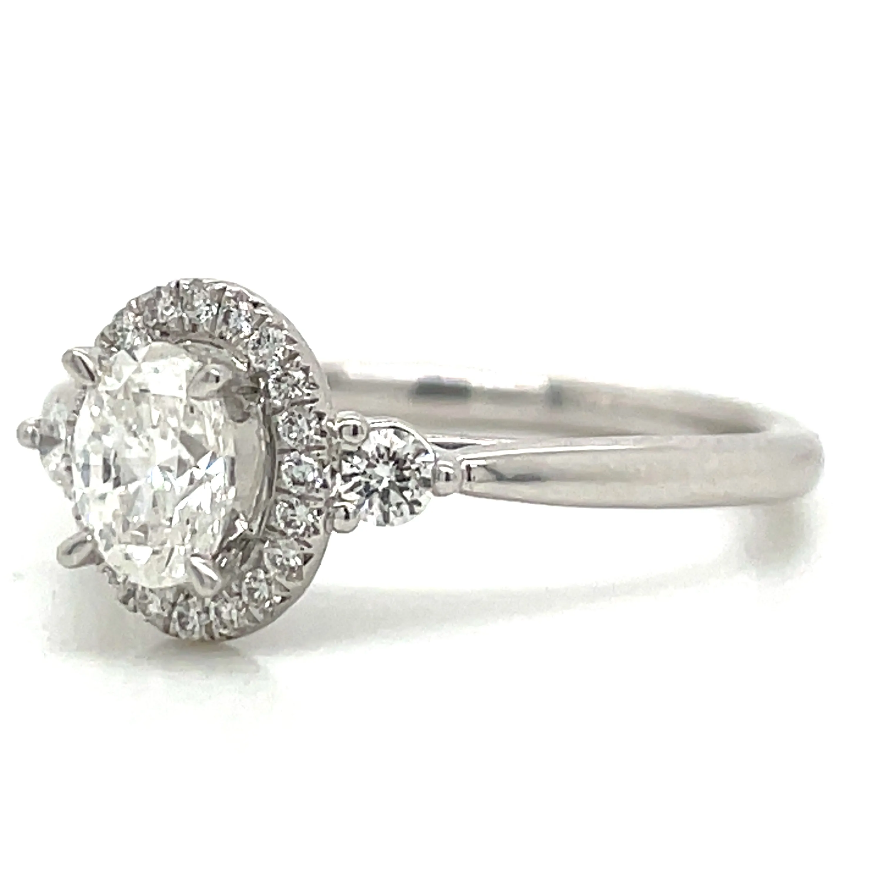 Remi - Platinum Natural 0.71ct Oval Halo Diamond Engagement Ring With Two Side Diamonds