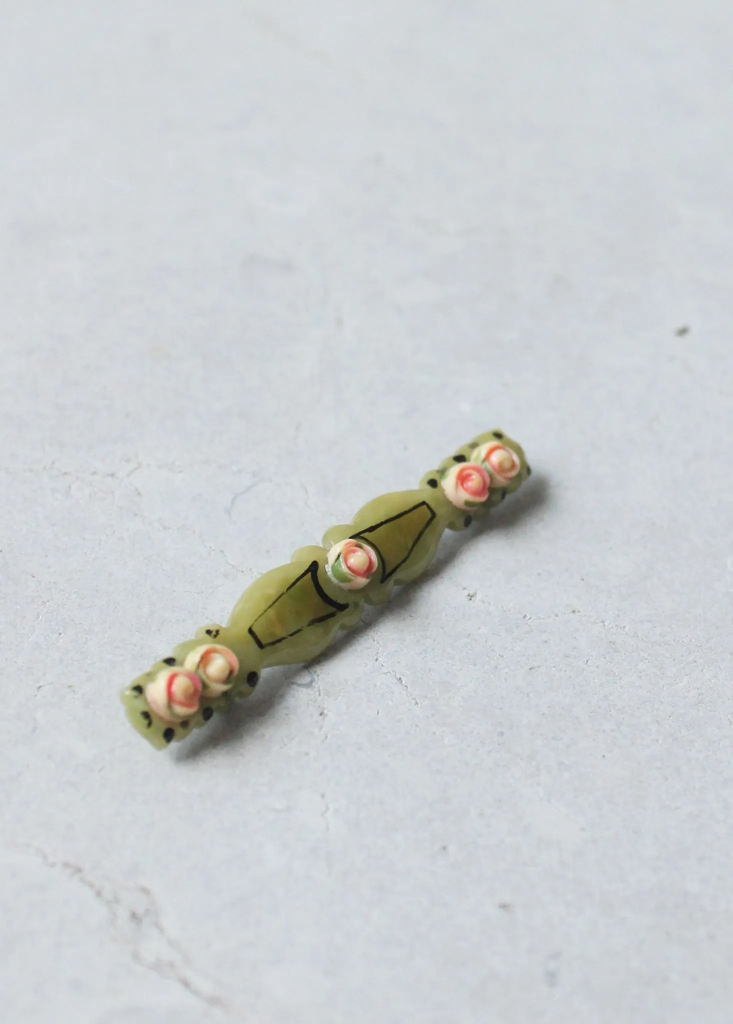 Vintage 1920s Painted Roses and Green Celluloid Bar Pin