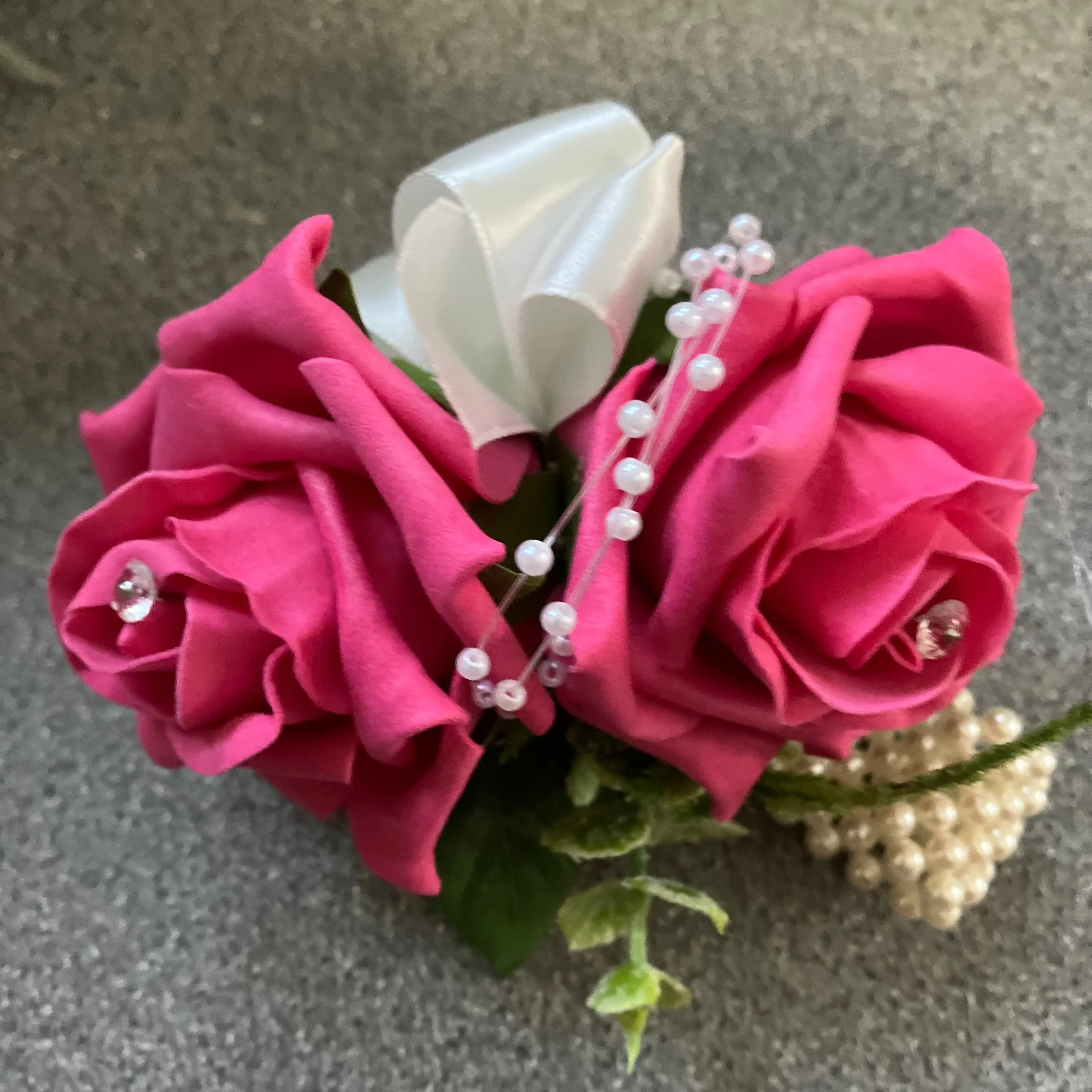 wrist corsage - features artificial foam roses (choice of over 35 colours)